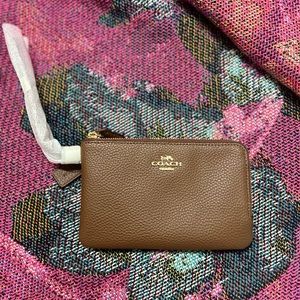 Authentic Coach Leather Wristlet In Saddle Brown.